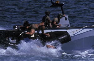 Navy SEALs practice high speed boat cast and recovery Navy SEALs practice high speed boat cast and recovery