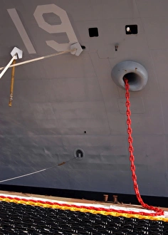 A new-12-shot anchor chain is hauled aboard the command ship USS Blue Ridge A new-12-shot anchor chain is hauled aboard the command ship USS Blue Ridge