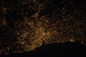 Nighttime image of Portugal showing city lights of Porto and Vila de Gaia Nighttime image of Portugal showing city lights of Porto and Vila de Gaia