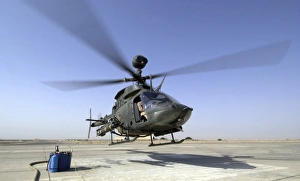 An OH-58D Kiowa Warrior helicopter taking off from Forward Operating Base MacKenzie An OH-58D Kiowa Warrior helicopter taking off from Forward Operating Base MacKenzie