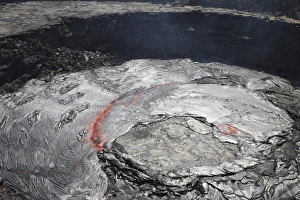 Overflowing lava lake in pit crater, Erta Ale volcano, Afar region, Danakil Depression Overflowing lava lake in pit crater, Erta Ale volcano, Afar region, Danakil Depression