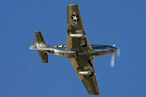 A P-51 Mustang flies by at Nellis Air Force Base, Nevada A P-51 Mustang flies by at Nellis Air Force Base, Nevada