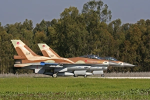 A pair of F-16C Barak of the Israeli Air Force on the runway A pair of F-16C Barak of the Israeli Air Force on the runway