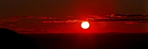 A panoramic image where clouds mimic solar prominences A panoramic image where clouds mimic solar prominences
