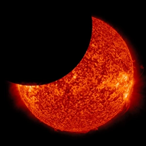 Solar Eclipse Photography Prints: A partial solar eclipse from space