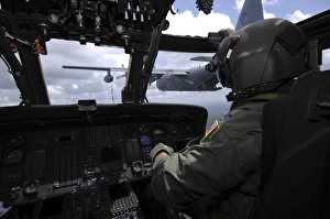 Pilot monitors the flight instruments in his HH-60 Pave Hawk Pilot monitors the flight instruments in his HH-60 Pave Hawk