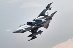An RAF Tornado GR-4 pulls away from a KC-135 Stratotanker after refueling An RAF Tornado GR-4 pulls away from a KC-135 Stratotanker after refueling