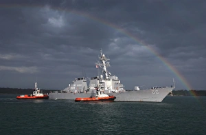 A rainbow arches over the guided missile destroyer USS Gonzalez A rainbow arches over the guided missile destroyer USS Gonzalez