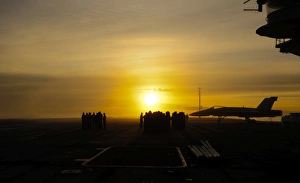 Sailors muster for quarters on the flight deck aboard USS Carl Vinson Sailors muster for quarters on the flight deck aboard USS Carl Vinson