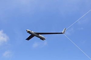 A Scan Eagle Unmanned Aerial Vehicle makes an arrested recovery on the Skyhook recovery A Scan Eagle Unmanned Aerial Vehicle makes an arrested recovery on the Skyhook recovery