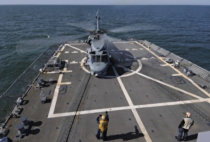 An SH-60B Sea Hawk lands on the flight deck of USS Forrest Sherman An SH-60B Sea Hawk lands on the flight deck of USS Forrest Sherman