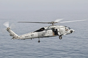 An SH-60F Seahawk gets airborne from the deck of USS Harry S. Truman An SH-60F Seahawk gets airborne from the deck of USS Harry S. Truman