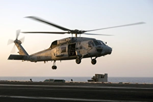 A Sikorsky SH-60F Seahawk lands on the flight deck of USS Dwight D. Eisenhower A Sikorsky SH-60F Seahawk lands on the flight deck of USS Dwight D. Eisenhower