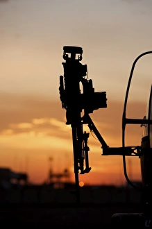Silhouette of a M240G medium machine gun on a UH-60L Black Hawk Silhouette of a M240G medium machine gun on a UH-60L Black Hawk