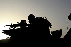 Silhouette of a Squad Automatic Weapon gunner Silhouette of a Squad Automatic Weapon gunner