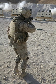 A soldier engages his target on a shooting range at Al Asad, Iraq A soldier engages his target on a shooting range at Al Asad, Iraq