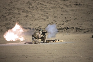 A soldier fires a rocket-propelled grenade launcher A soldier fires a rocket-propelled grenade launcher