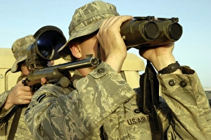 Soldiers demonstrate a buddy sniper position Soldiers demonstrate a buddy sniper position