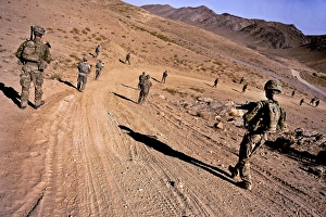 Soldiers patrol to a village in the district of Mizan, Afghanistan Soldiers patrol to a village in the district of Mizan, Afghanistan