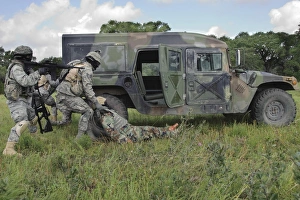 Soldiers recover the victim of a simulated roadside bomb Soldiers recover the victim of a simulated roadside bomb