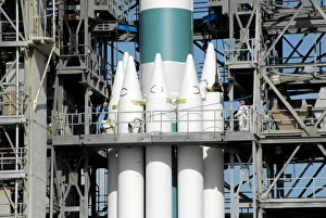 Cape Canaveral Air Force Station Prints: Solid rocket boosters are attached to the Delta II rocket in the mobile service tower