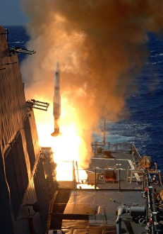 A Standard Missile 2 launches from the aft Vertical Launching System aboard USS O'Kane A Standard Missile 2 launches from the aft Vertical Launching System aboard USS O'Kane