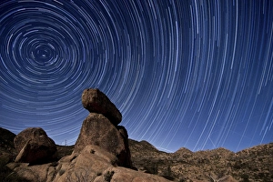 Star trails above a granite rock formation in Cleveland National Forest, California Star trails above a granite rock formation in Cleveland National Forest, California