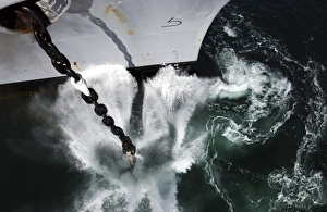 The starboard anchor of USS Ronald Reagan is released into the ocean The starboard anchor of USS Ronald Reagan is released into the ocean