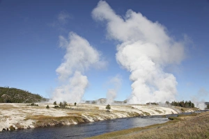 Steam rising over Midway Geyser Basin geothermal area, Yellowstone National Park, Wyoming Steam rising over Midway Geyser Basin geothermal area, Yellowstone National Park, Wyoming