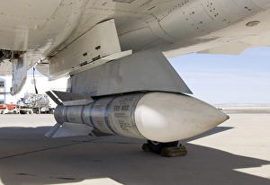 Surplus Navy Phoenix missiles mounted on the centerline pylon of NASAs F-15B research Surplus Navy Phoenix missiles mounted on the centerline pylon of NASAs F-15B research