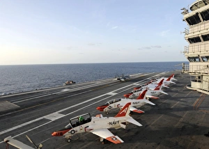 T-45C Goshawk training aircraft line the flight deck aboard the aircraft carrier USS George H T-45C Goshawk training aircraft line the flight deck aboard the aircraft carrier USS George H