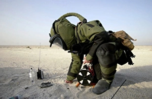 A technician dressed in a EOD-8 Explosive Ordnance Disposal Suit A technician dressed in a EOD-8 Explosive Ordnance Disposal Suit