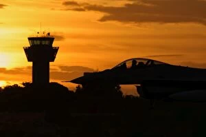 Air Traffic Control Tower Collection: U. S. Air Force F-16 Fighting Falcon at sunset