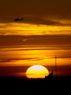 A UH-60 Black Hawk helicopter flies over Joint Base Balad, Iraq A UH-60 Black Hawk helicopter flies over Joint Base Balad, Iraq