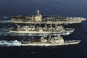 USNS Bridge conducts a replenishment at sea with USS John C. Stennis and USS Mobile Bay USNS Bridge conducts a replenishment at sea with USS John C. Stennis and USS Mobile Bay