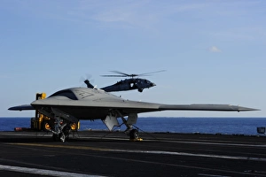 The X-47B Unmanned Combat Air System aboard USS Harry S. Truman The X-47B Unmanned Combat Air System aboard USS Harry S. Truman