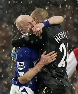 Images Dated 18th March 2007: Evertons goalscorer Johnson celebrates with Tim Howard