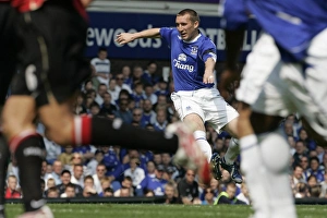 Evertons Stubbs shoots to score during their English Premier League soccer match against Manchester Evertons Stubbs shoots to score during their English Premier League soccer match against Manchester