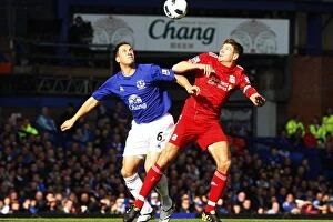 Images Dated 17th October 2010: Intense Rivalry: Jagielka vs. Gerrard - The Battle for the Ball at Goodison Park (Everton vs)