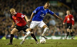 Marcus Bent gets away from Paul Scholes Marcus Bent gets away from Paul Scholes