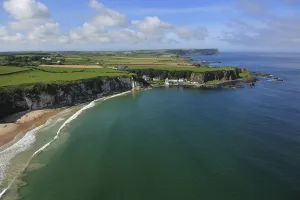 Aerial view of Portbraddan and Whitepark Bay, north coast, County Antrim, Northern Ireland Aerial view of Portbraddan and Whitepark Bay, north coast, County Antrim, Northern Ireland