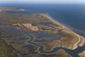 Aerial view of saltmarshes at Titchwell RSPB reserve, Norfolk, UK, September 2009 Aerial view of saltmarshes at Titchwell RSPB reserve, Norfolk, UK, September 2009