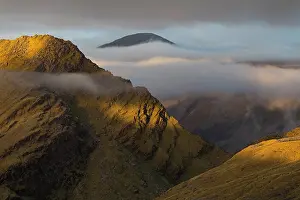 South Island Mountain Scenery Prints: The alpine tussock and boulder fields of the Haast Range under low cloud