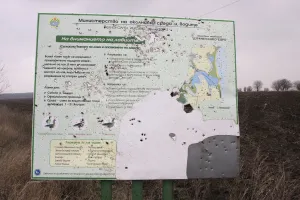 Battered sign showing the information about the area around Durankulak Lake, Bulgaria Battered sign showing the information about the area around Durankulak Lake, Bulgaria