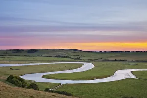 The Cuckmere River at sunset, Seven Sisters Country Park, South Downs National Park The Cuckmere River at sunset, Seven Sisters Country Park, South Downs National Park
