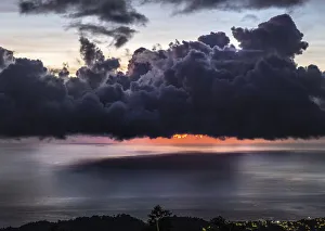Dramatic sunset with storm clouds over Roseau, Caribbean sea view in Dominica, Lesser Antiles. September 2019 Dramatic sunset with storm clouds over Roseau, Caribbean sea view in Dominica, Lesser Antiles. September 2019