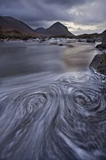 Eddies in the River Sligachan with Marsco in background. Isle of Skye, Scotland, UK Eddies in the River Sligachan with Marsco in background. Isle of Skye, Scotland, UK
