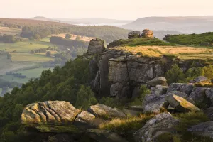 Froggatt Edge, a gritstone escarpment. Peak District National Park, UK, July 2009 Froggatt Edge, a gritstone escarpment. Peak District National Park, UK, July 2009