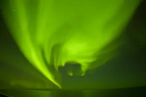 Green Aurora borealis over the Beaufort Sea, seen from the 1002 area of the Arctic Green Aurora borealis over the Beaufort Sea, seen from the 1002 area of the Arctic