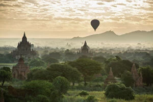 Ancient Collection: Hot air balloon over the Temples of Bagan at dawn, Myanmar, November 2012